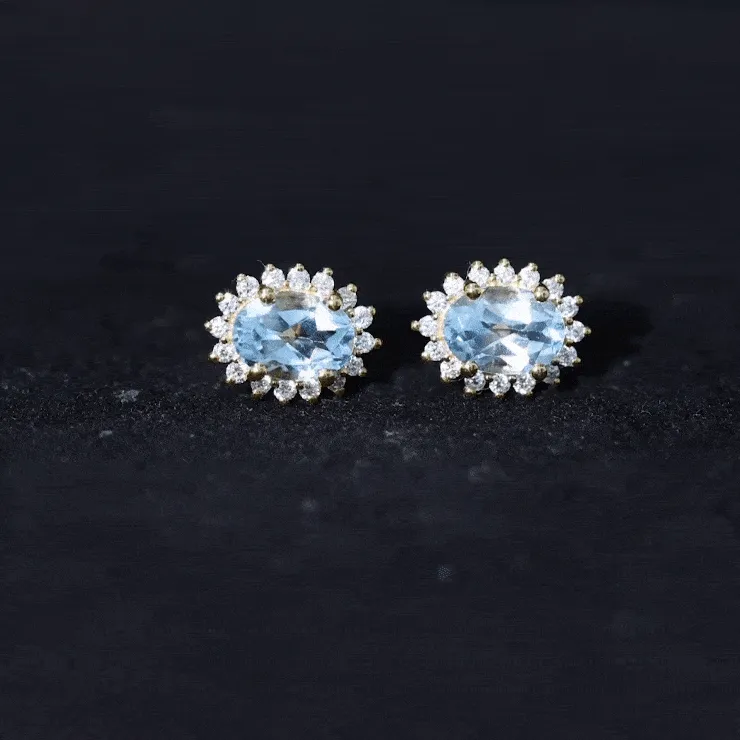 1.75 CT Oval Sky Blue Topaz Classic Stud Earrings with Diamond Halo