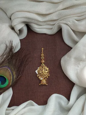 Antique Tikka Featuring Lord Krishna with Kemp and Green Stones