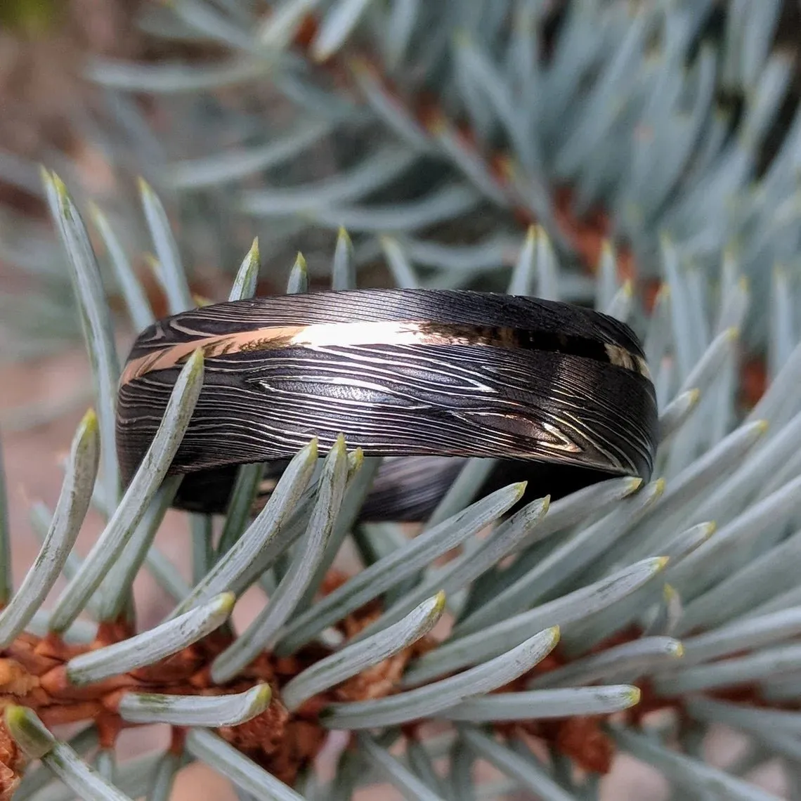 Authentic Damascus Steel Wedding Ring With 14k Rose Gold Inlay